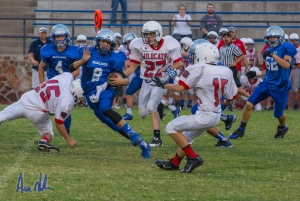 Jackson Waddell makes a move on the Ponca City defense.